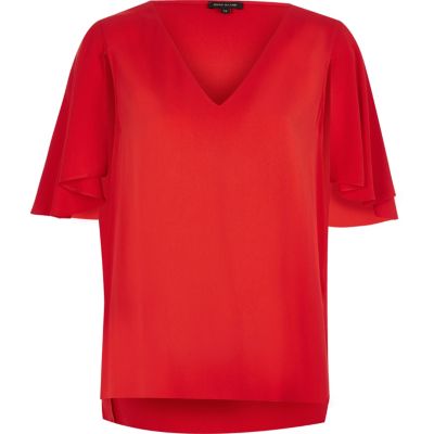Red cape sleeve top